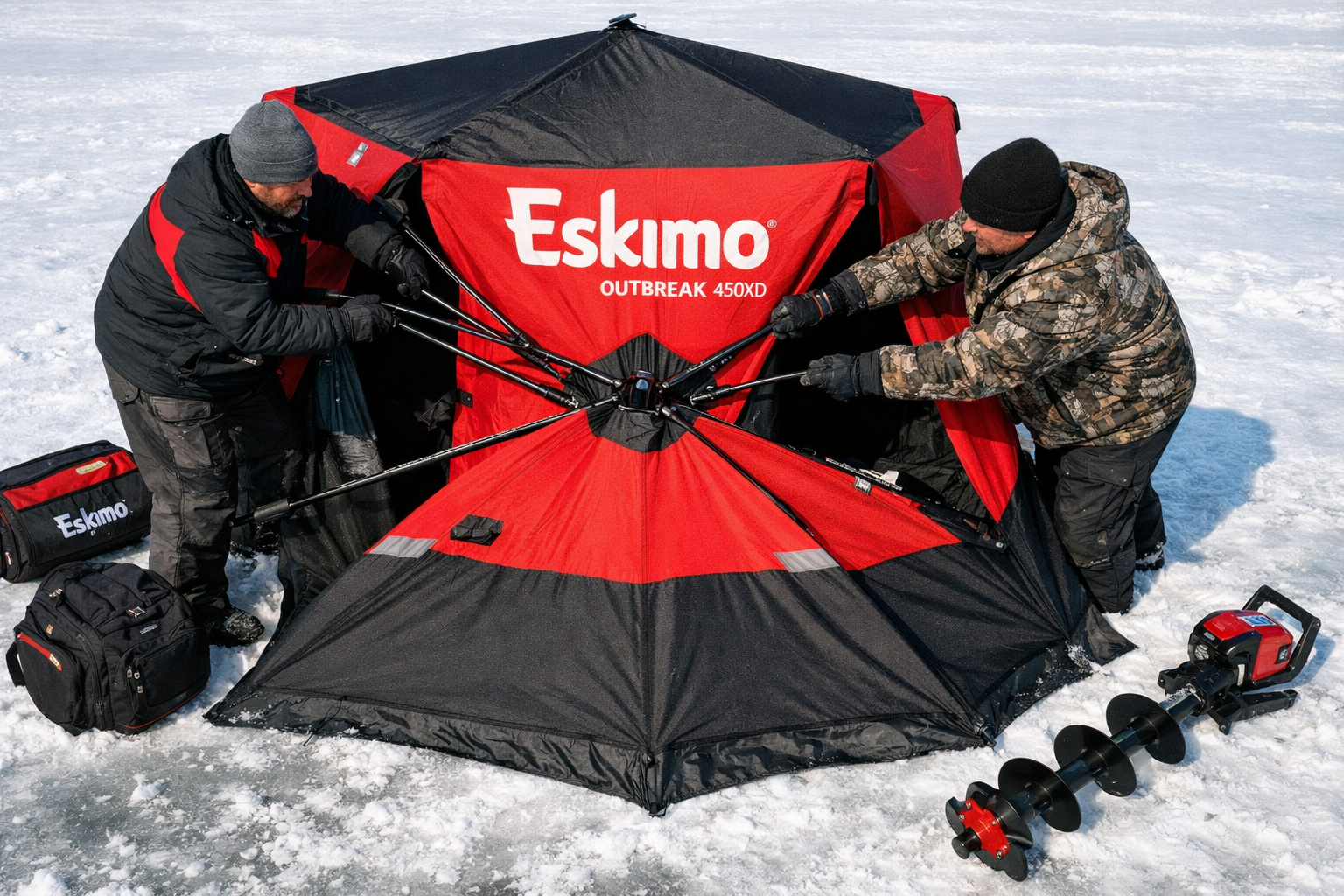 Detailed () showing close-up overhead view of Eskimo Outbreak 450XD hub shelter being set up by two anglers on thick white